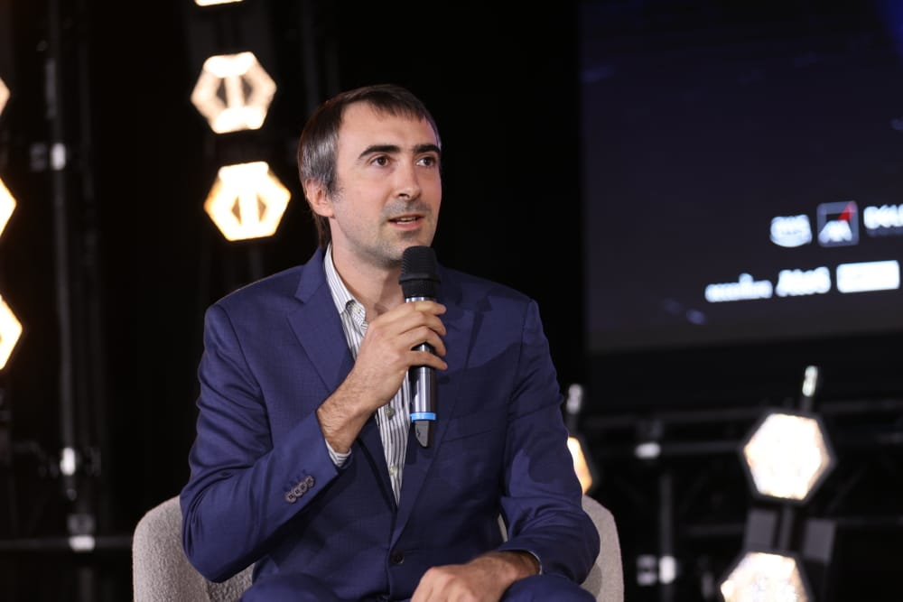 Timothée Lacroix speaking on stage
