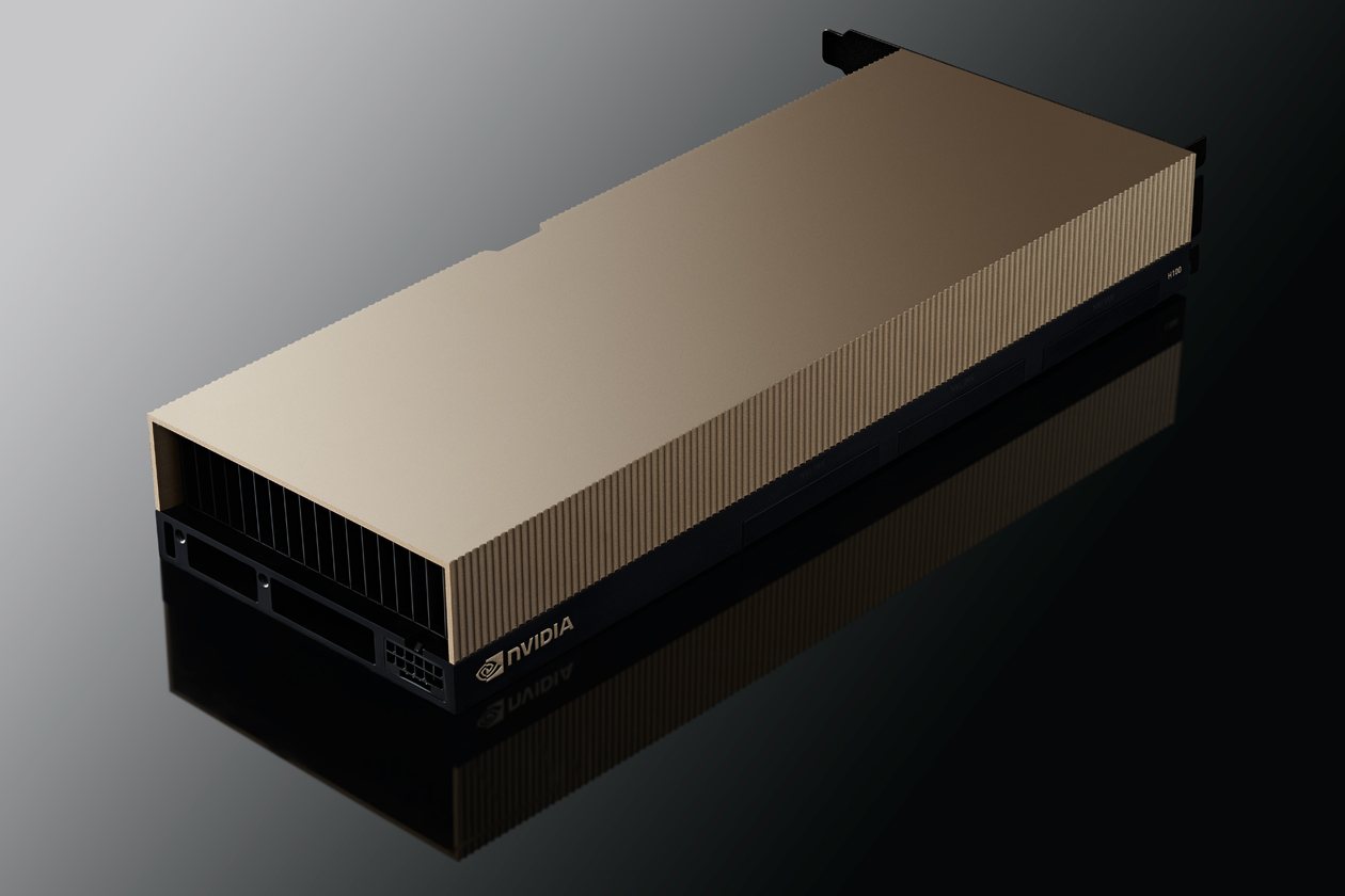 An NVIDIA H100 card in its gold shroud