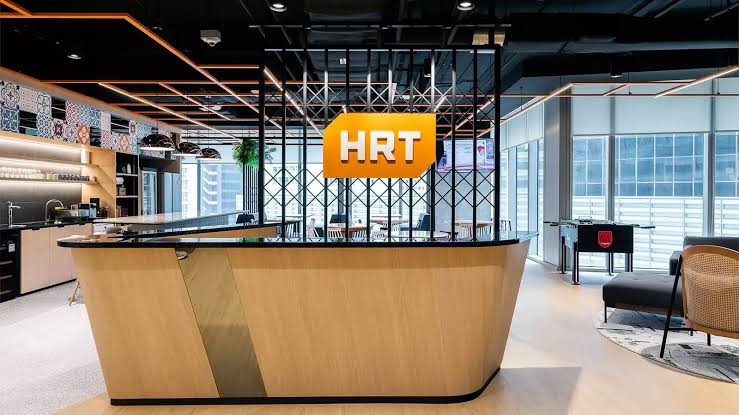 The Hudson River Trading reception desk under the HRT sign